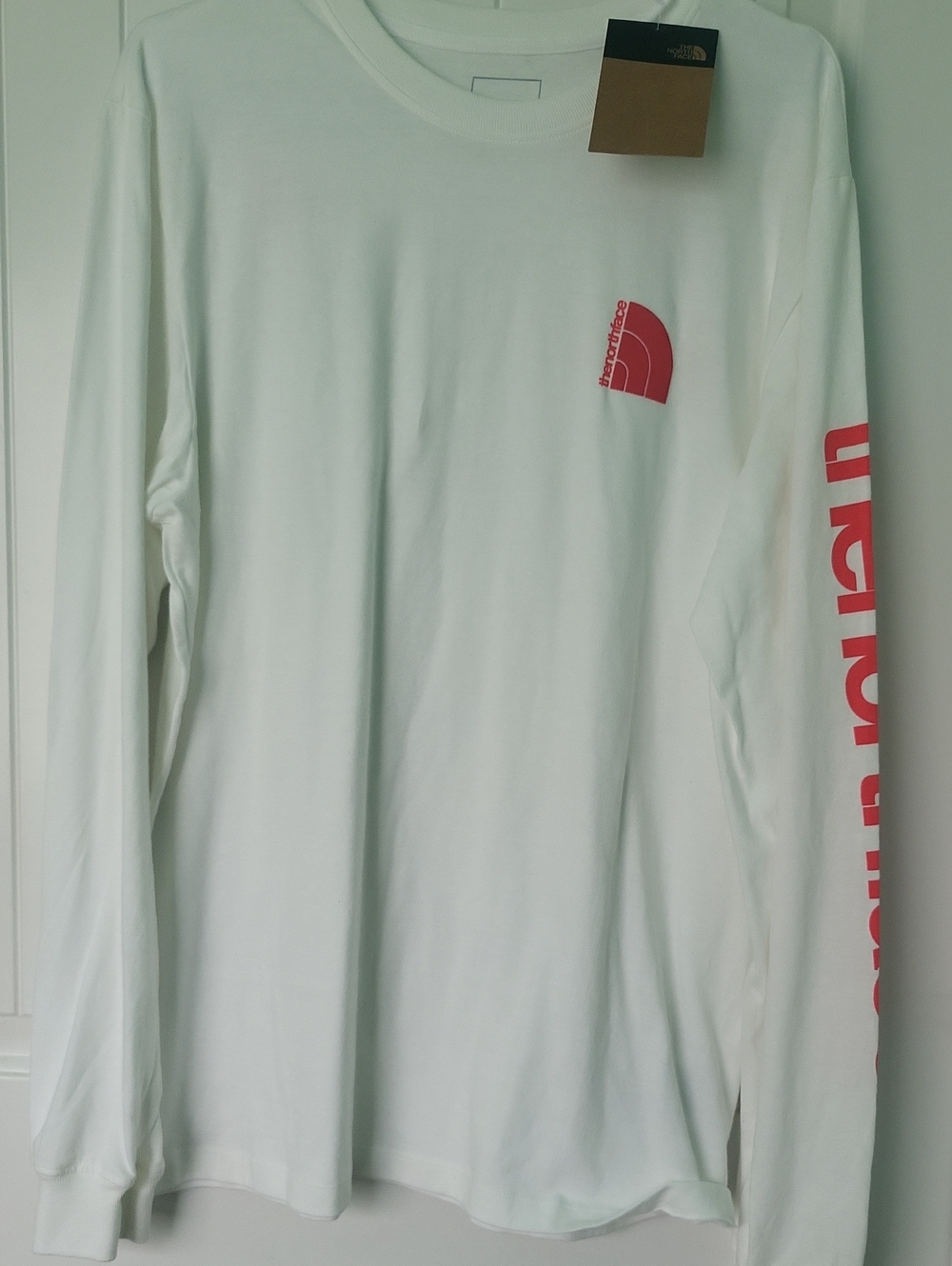 The North Face White Long-Sleeve Tee with Coral Logo Sleeve Print